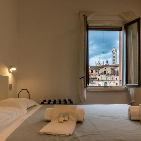 The View Apartment Siena Bagian luar foto